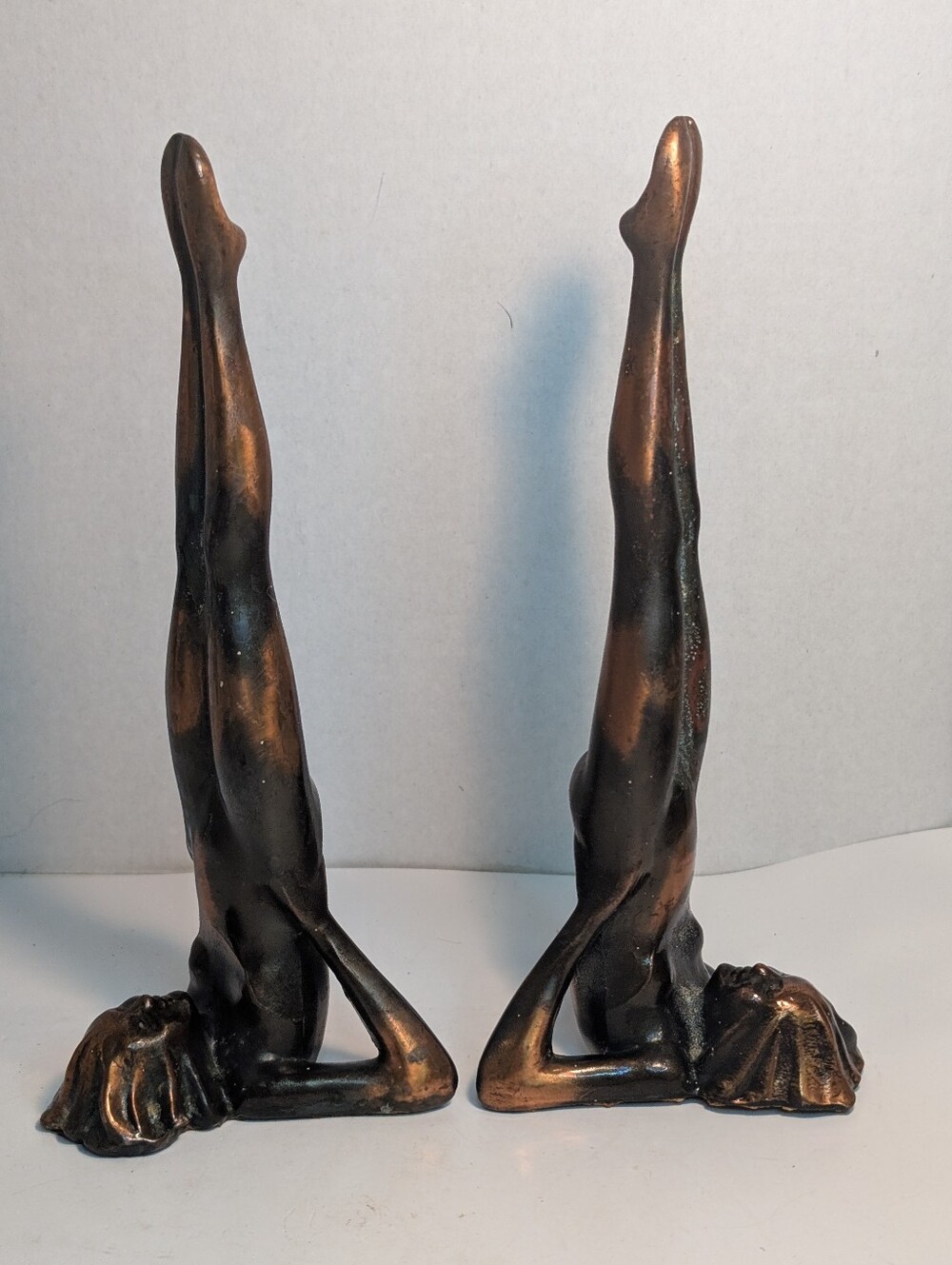 Frankart, Art Deco style bookends feature bronze-finished cast metal figures